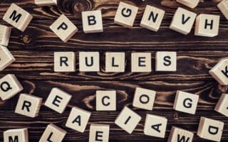 top view of rules word made of wooden blocks