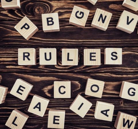 top view of rules word made of wooden blocks