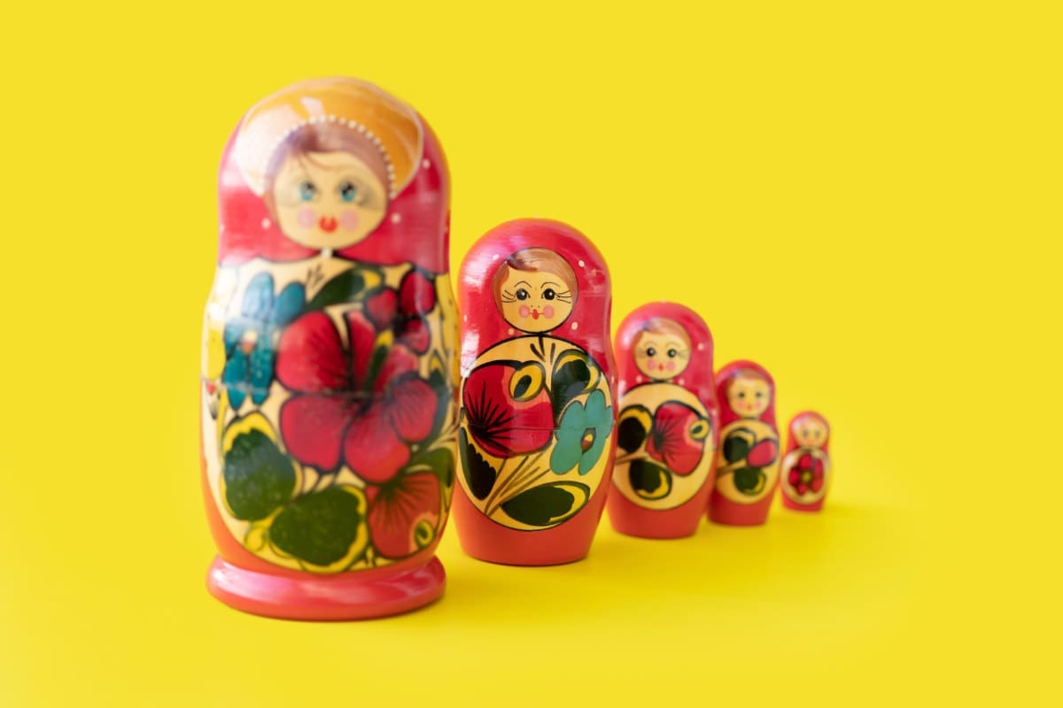 Matryoshka doll set in a row isolated. A symbol of the feminine side of Russian traditional and culture. Wooden doll toys. Crafts, painting and art.